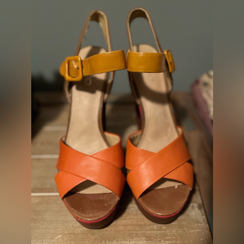 Platform ankle strap heel.